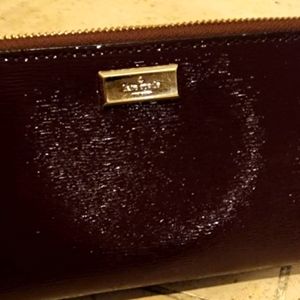 KATE SPADE large zippered wallet in dark plum